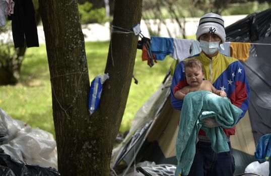 Venezuela: Obdachlose im Park mit
                                H�ngematte - Foto: AFP.