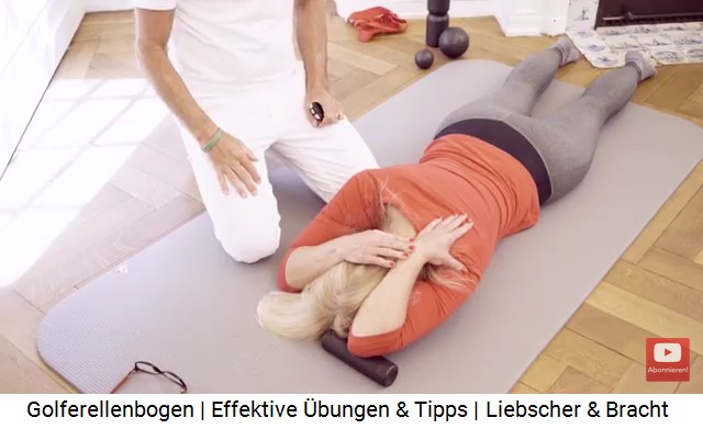 �bung 4 f�r den
                      Ellenbogen: In Bauchlage wird der betroffene Arm
                      gerade ausgestreckt, dann auf der kleinen
                      Massagerolle gebeugt, so dass die Hand die
                      Schulter ber�hrt. Dann wird die andere Hand auf
                      das linke Schultergelenkt gelegt, um noch mehr
                      "Zug" zu provozieren.