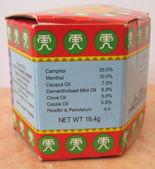 The box of
                      tiger balm with the indications about the
                      ingredients: camphor 25%, menthol 10%, cajuput oil
                      7%, dementholised mint oil 6%, clove oil 5%,
                      cassia oil 5%, paraffin and petrolatum for making
                      the cream