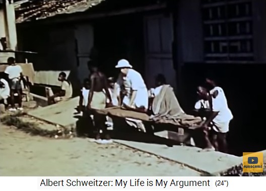 Spitaldorf Lambarene, ein Patient wird auf
einer Holzbahre getragen Spitaldorf Lambarene,
ein Patient wird auf einer Holzbahre getragen