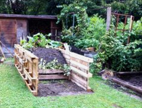 raised bed with
                          pallets, pallet raised bed under construction