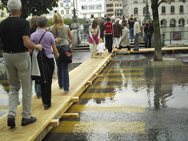 Flood in Switzerland of 2005 in
Lucerne: little bridge in the floods Flood in Switzerland of 2005
in Lucerne: little bridge in the floods