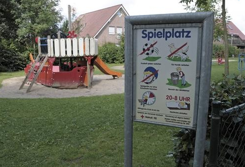 Playground shield 02 with logos
                                    in Saerbeck, North Rhine Westfalia,
                                    Germany