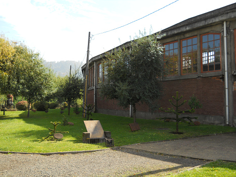 Botanical garden with scored trees at
                              the Railway Museum of Temuco in Chile