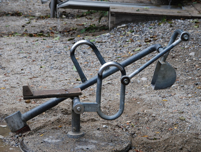 Children's digger on a playground in
                            Frasdorf in Bavaria, Germany