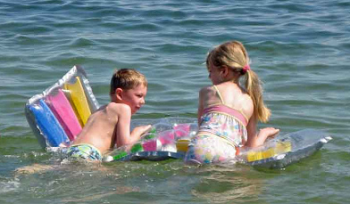 Water plays 04
                              showing an inflatable mattress which can
                              also convert into an island for talks