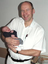 Un ginec�logo (aqu�: Dr.
                                Gross con un bebe)